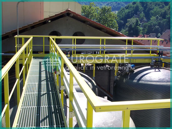 grating walkways and handrails for roof walkways over chemical tanks