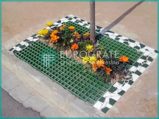 gratings and flowers used ornamentally to cover a hole