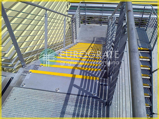 Fibreglass tread covers applied to metal gratings