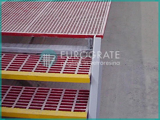 Red and yellow grating stair treads for employee safety